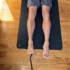 Brad Lying On The Earthing Single Sided Grounded Yoga Mat.Png