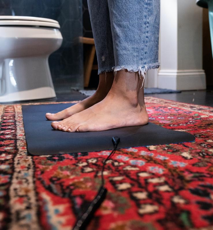 Standing On A Universal Mat.Jpg