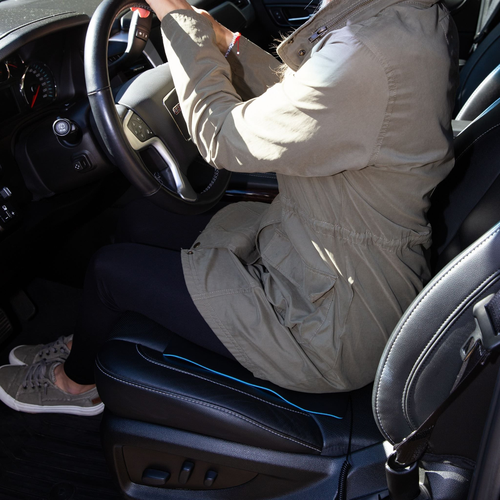 Sitting On He Earthing Auto Seat Mat.Jpg