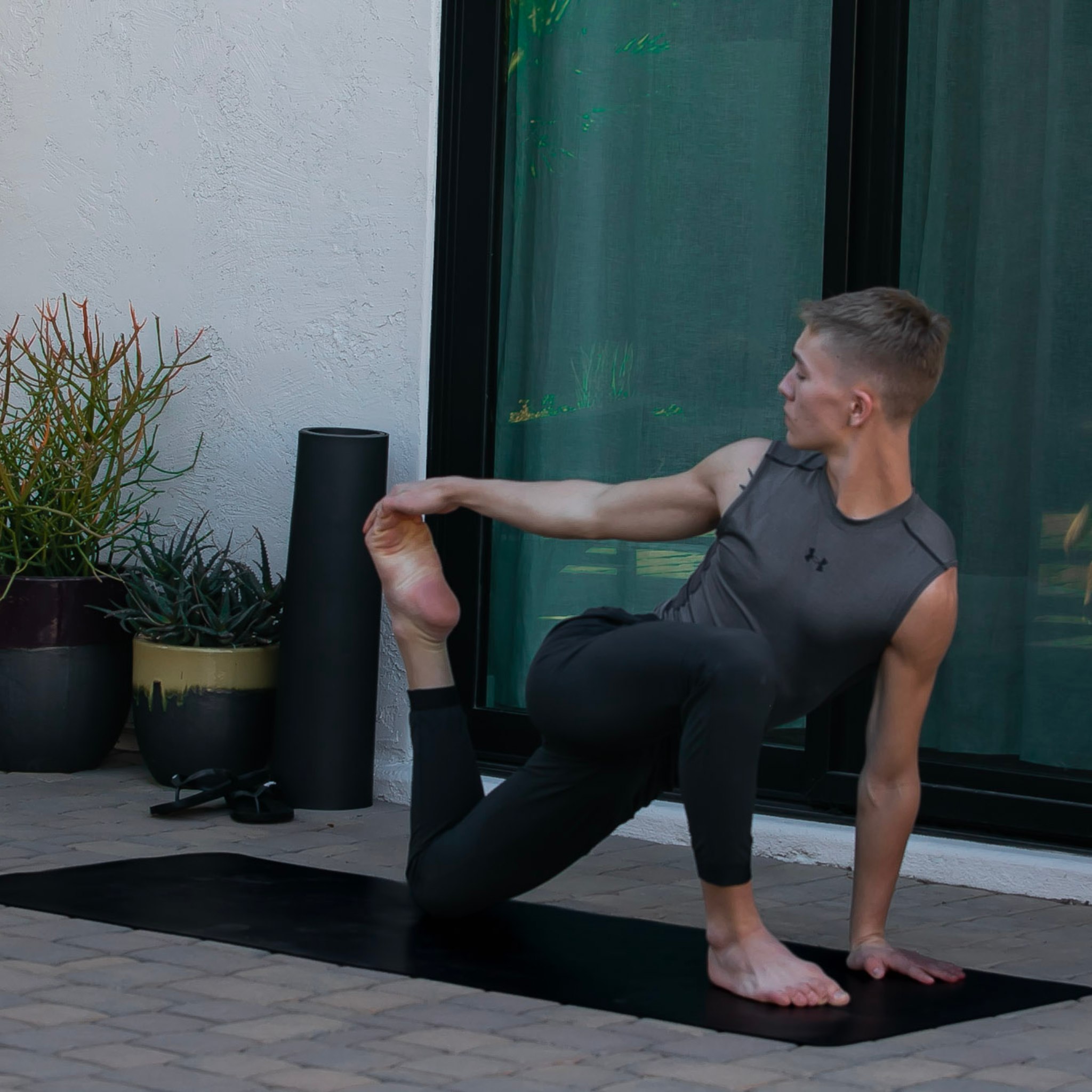 Practicing Yoga On The Earthing Grounded Yoga Mat.Png